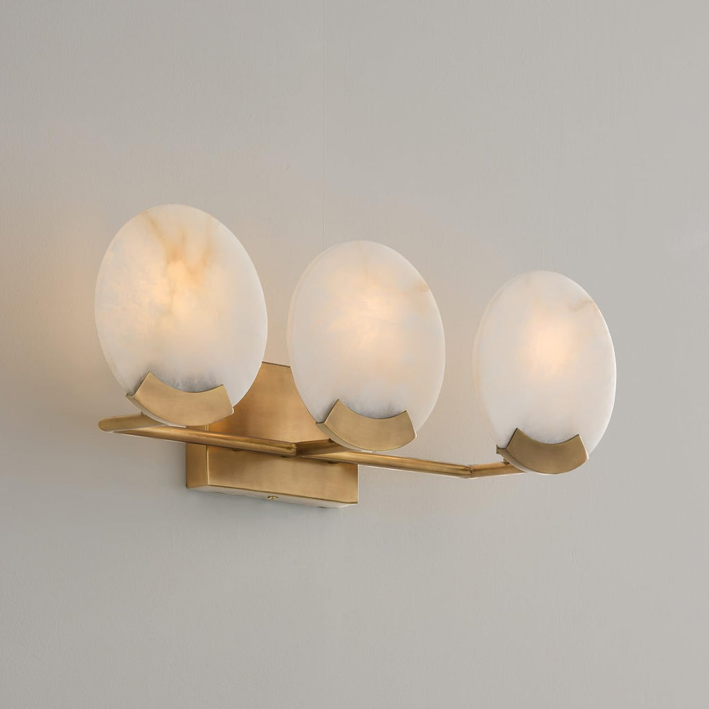 Capital Lighting 154631AD Oriya Modern Natural Alabaster Stone Bathroom Vanity Light, 3-Light 180 Total Watts, 8" H x 24" W, Aged Brass