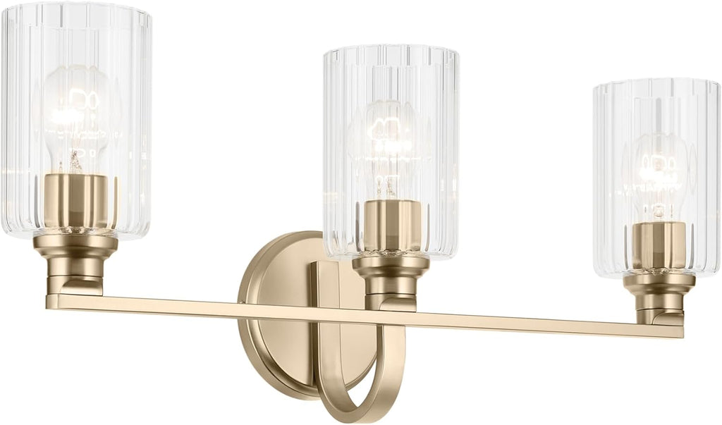 Kichler Gioe 24.25" 3-Light Bathroom Vanity Light Fixture with Clear Fluted Glass in Champagne Bronze, Damp Rated for Mirror, Powder Room (24.25" W x 10.5" H), 55226CPZFLU