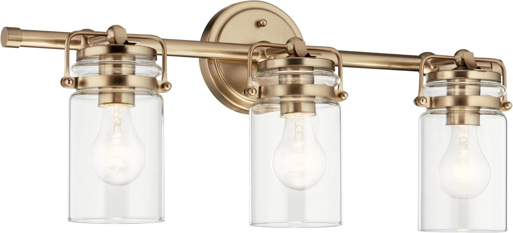 Kichler Brinley 24" 3-Light Bathroom Vanity Light Fixture with Clear Glass in Champagne Bronze, Modern Farmhouse Mason Jar Style for Mirror Lighting (24" W x 10.25" H), 45689CPZ