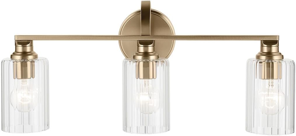 Kichler Gioe 24.25" 3-Light Bathroom Vanity Light Fixture with Clear Fluted Glass in Champagne Bronze, Damp Rated for Mirror, Powder Room (24.25" W x 10.5" H), 55226CPZFLU
