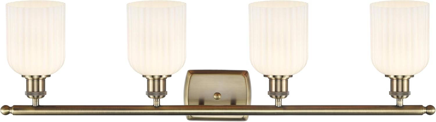 INNOVATIONS LIGHTING Ballston - Bridal Veil - 4 Light 35" Bath Vanity Light - Antique Brass Finish - Gloss White Shade