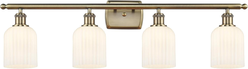 INNOVATIONS LIGHTING Ballston - Bridal Veil - 4 Light 35" Bath Vanity Light - Antique Brass Finish - Gloss White Shade